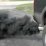 black smoke from a diesel engine on a car