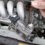 Cleaning the throttle body in Toyota Corolla