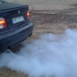 blue smoke from a car chimney