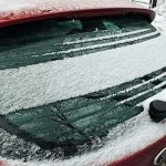 How does the rear window defroster work?