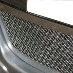 Protective mesh for radiator grille